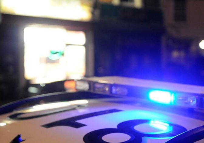 A police car with flashing blue lights